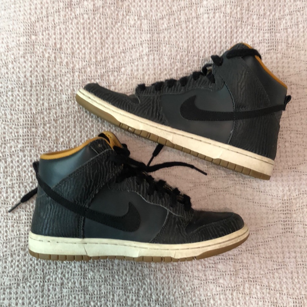 Gold and black Nike high-tops size 7.5